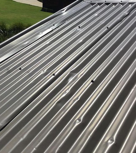 Storm and hail damage roof repair Adelaide — cracked tiles and displaced ridge capping, Adelaide, Australia